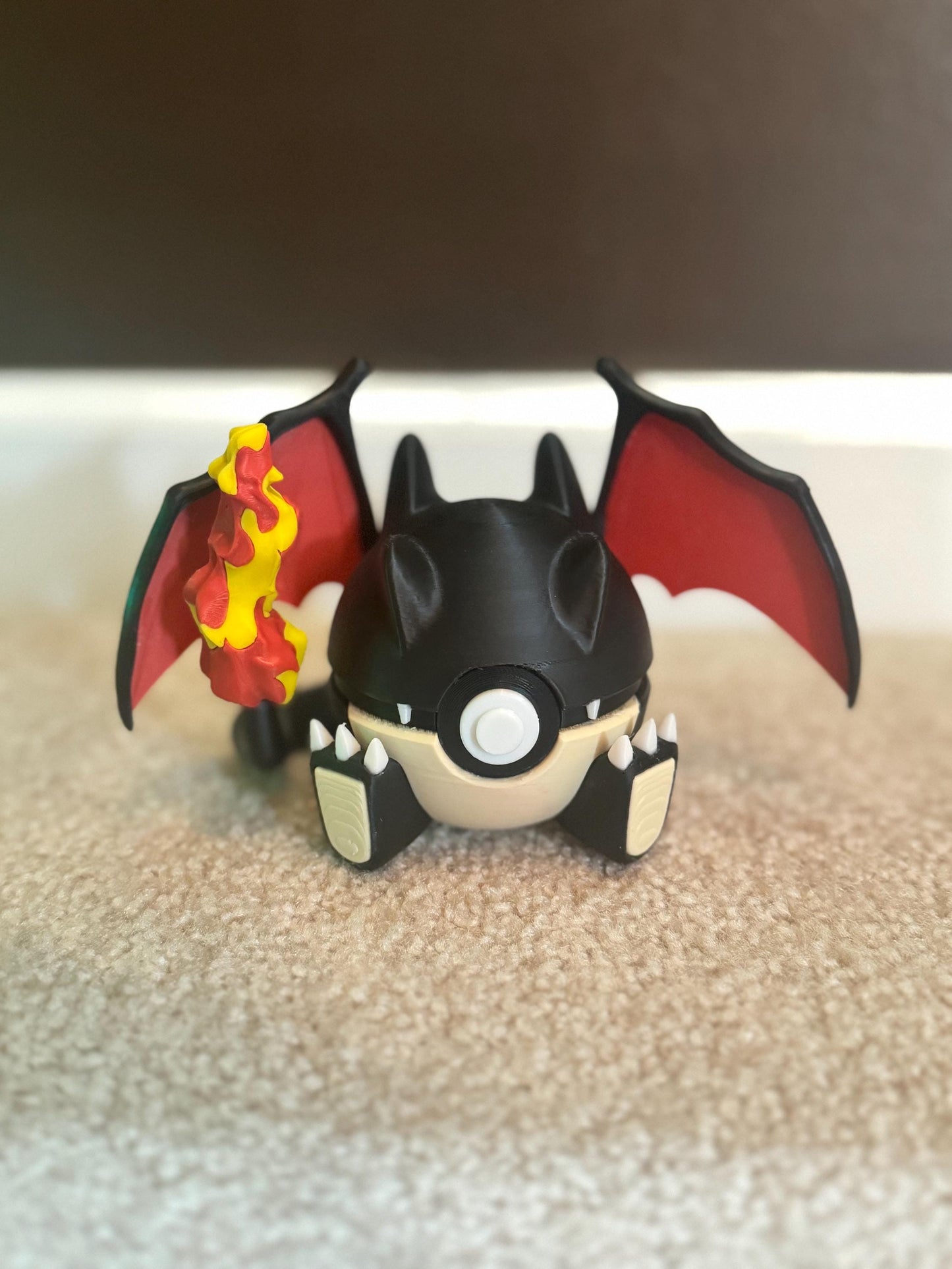 Charizard Themed Pokéball, a great addition to your original 151 Pokémon collection!
