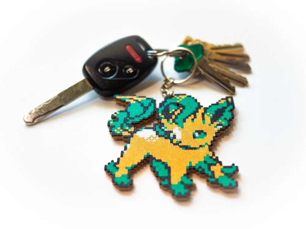 Eevee Evolution Keychain – All Eeveelutions Pokémon Keyring, Cute Pokémon Charm, Gift for Pokémon Fans, Collectible Accessory
